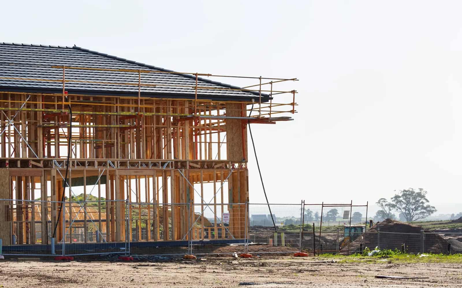 A residential construction project in progress representing the financial decisions surrounding a client relationship.